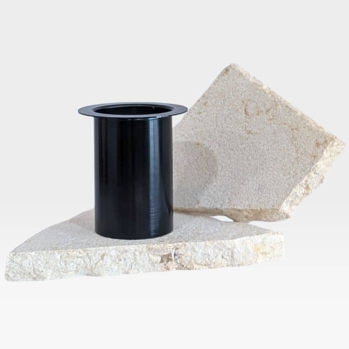 Black metal candle insert designed for refillable stone candle holders by Stone Design & Co