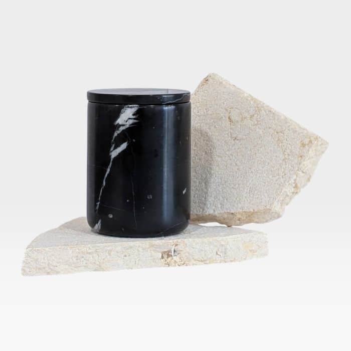 Black Marquina marble candle holder with refillable insert, handcrafted stone vessel with natural veining