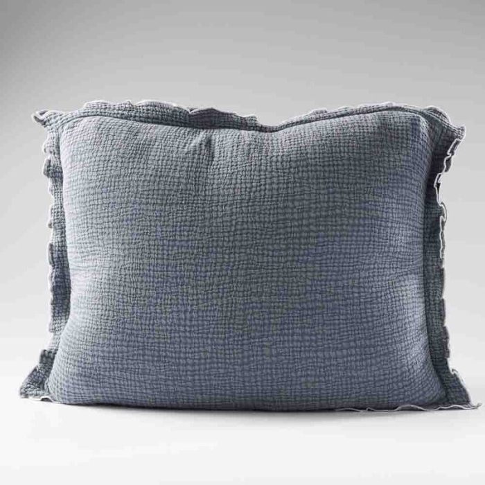 Eadie Onda Cushion in steel blue, elegant and stylish for any space.
