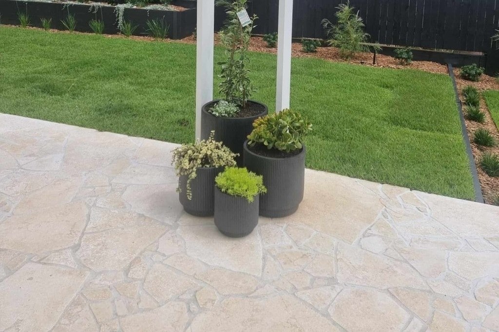 Limestone and travertine crazy paving for outdoor patios, garden paths, and pool surrounds in Australian homes. Irregularly shaped stones create a natural, free-flowing aesthetic while providing durable, slip-resistant surfaces. Limestone offers smooth textures and earthy tones, perfect for consistent, low-maintenance paving, while travertine adds rustic charm and a slightly textured finish ideal for warm, inviting outdoor spaces. Both stones are suitable for high-traffic areas, poolside layouts, entertaining zones, and garden walkways. Easy to maintain with proper sealing, limestone and travertine paving enhances the visual appeal of patios, courtyards, and landscaped gardens while offering long-lasting performance. Available in versatile colours and finishes, these natural stones combine strength, style, and timeless beauty for residential and commercial outdoor projects.