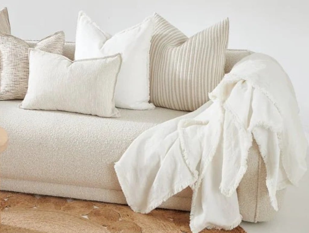 Draped, natural throw blanket