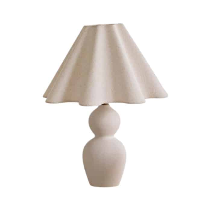 White sculptural lamp with wavy linen lampshade