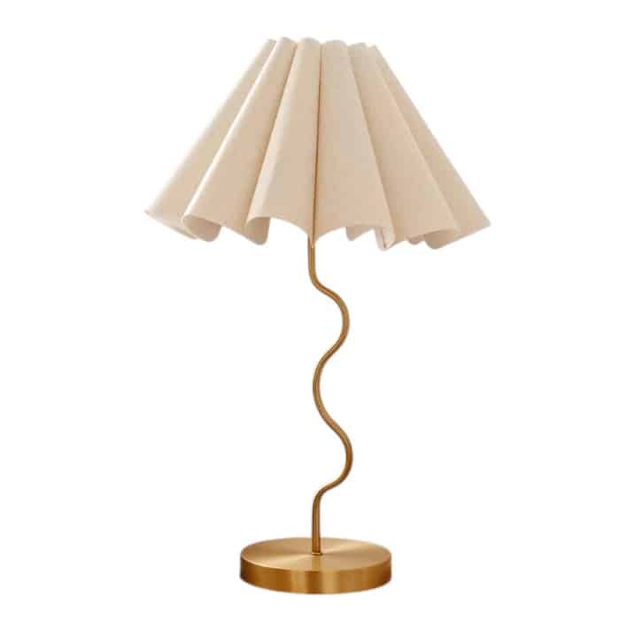 Wavy brass gold table lamp base with linen shapely lampshade