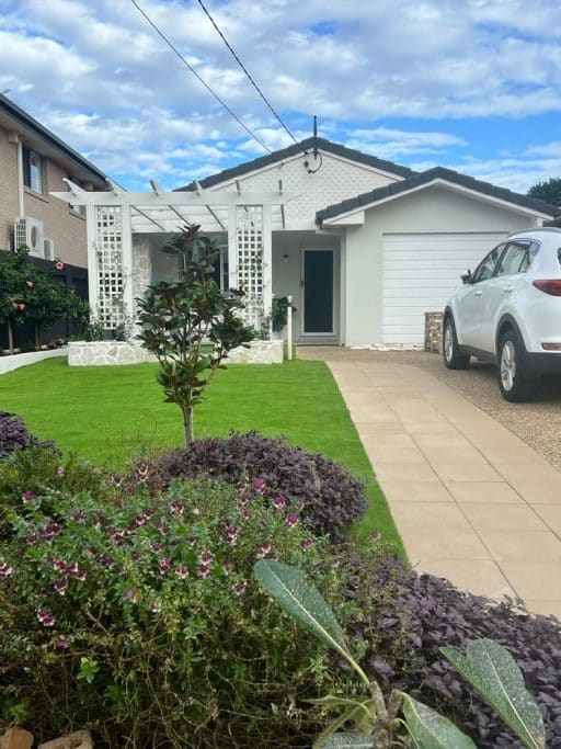 Elegant facade update with natural Nimbin Quartz cladding. The textured stone exterior combines durability, timeless appeal, and modern street presence.