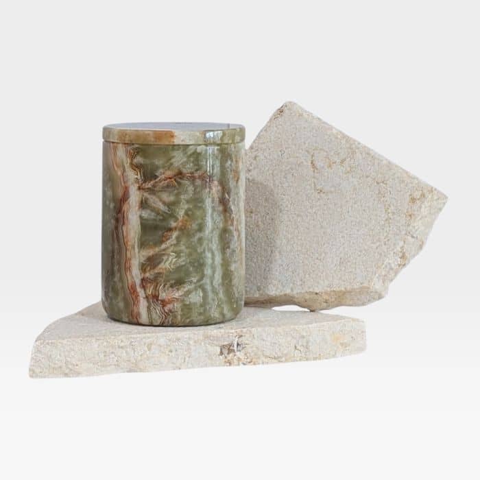 Green onyx stone candle vessel with refillable insert, featuring layered veining and natural green tones