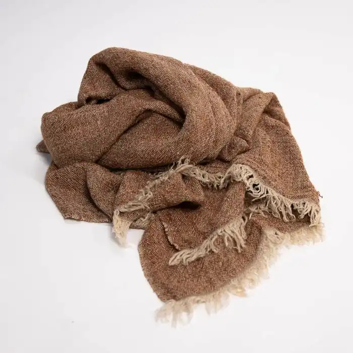 Handwoven Tabako Linen Throw by Eadie Lifestyle in warm tobacco tone with natural fringe detail