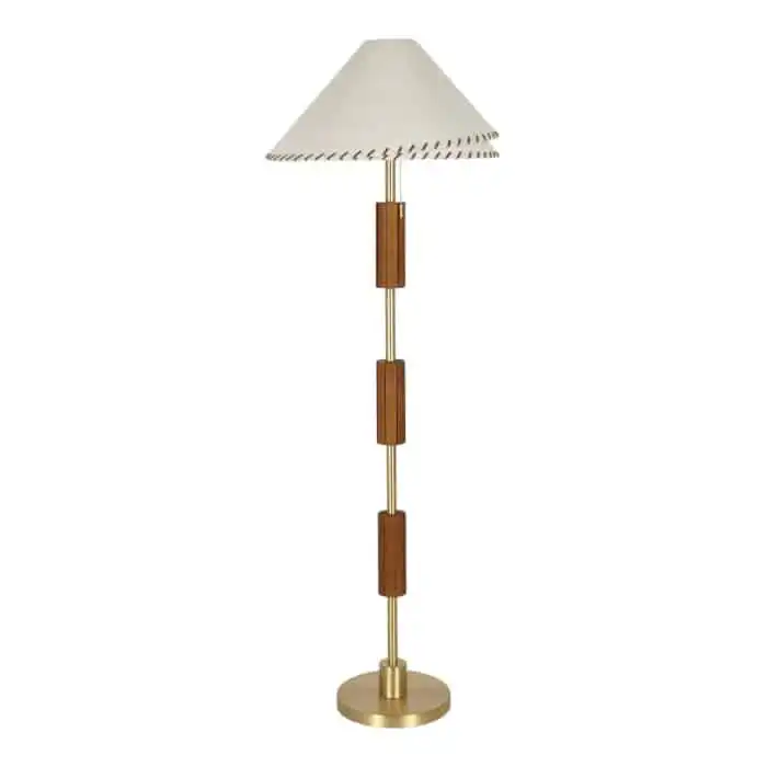 Zali floor lamp by Paola and Joy with wooden stem, brass-plated base and tapered linen shade on neutral background