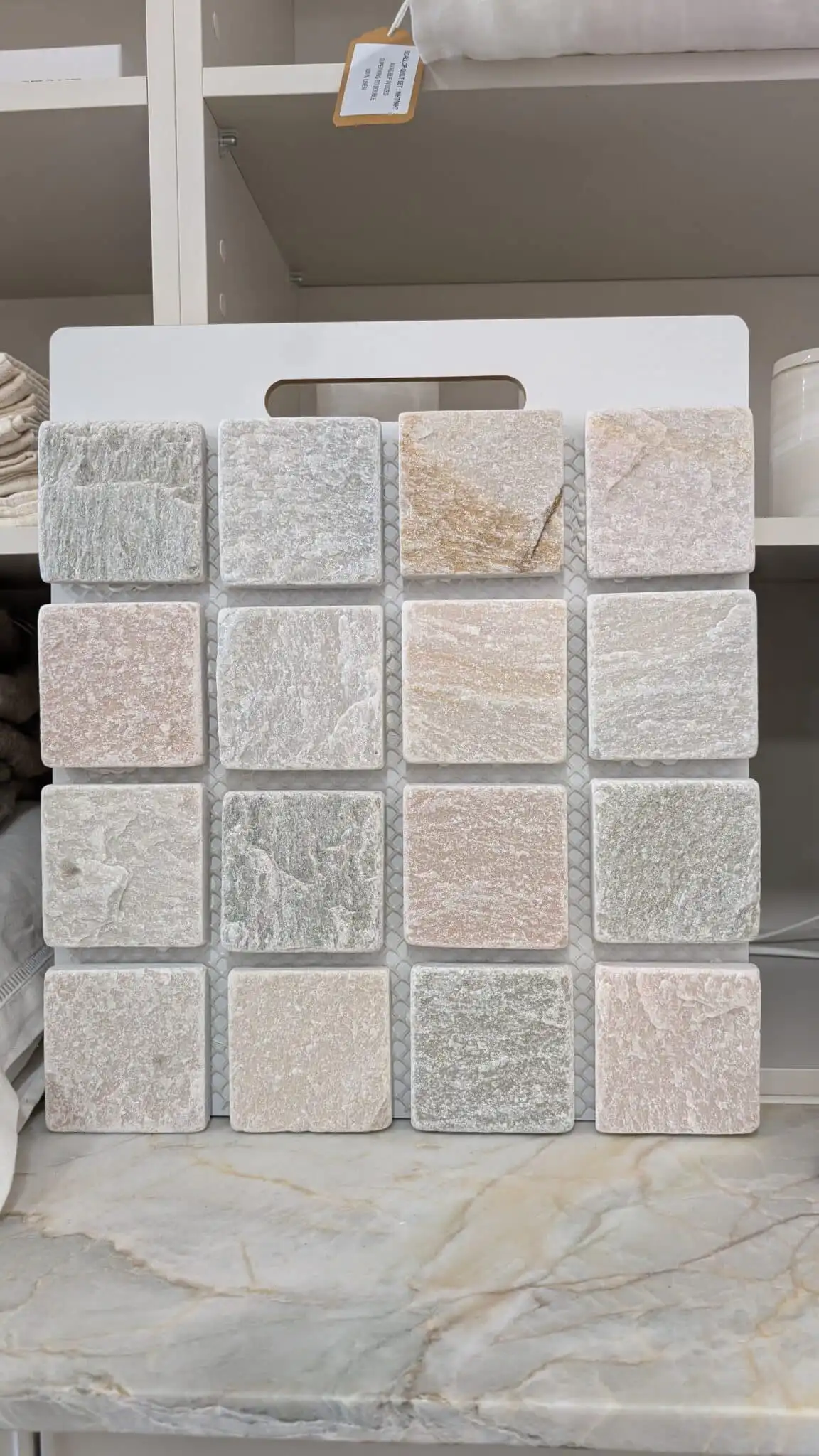 Close-up of Sorrento Quartz tumbled cobblestone showing natural quartz texture and soft neutral colour variation