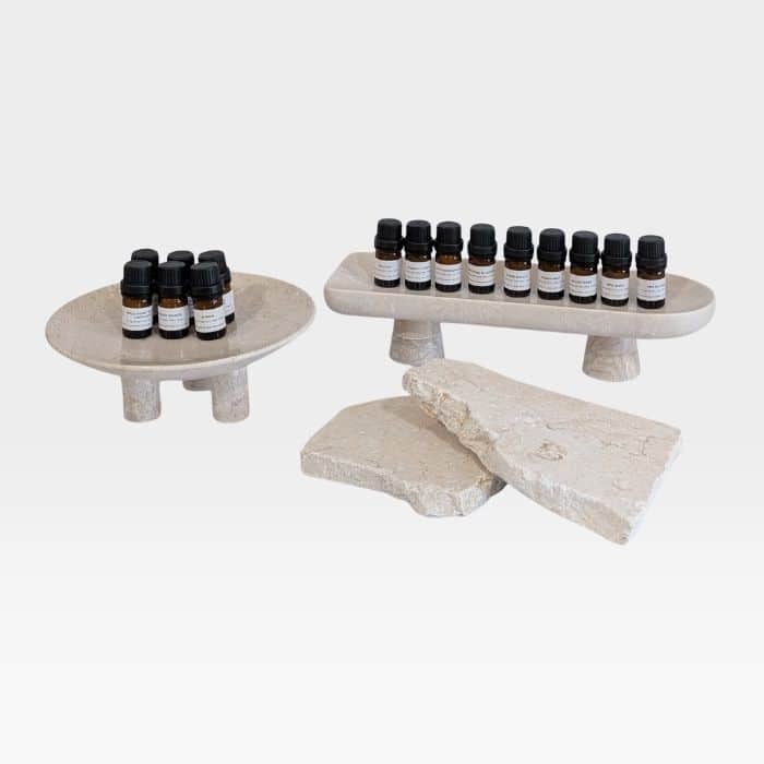 SD&CO candle fragrance testers in 5ml vessels on natural stone trays