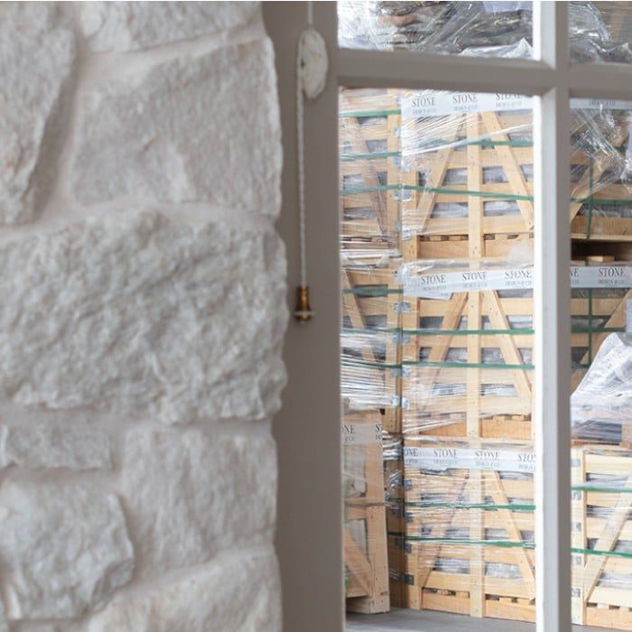 Natural stone pallets ready for distribution at Stone Design & Co Australia