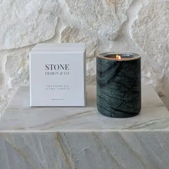 Stone Design & Co natural refillable stone candle in deep green marble with white gift box, sustainable fragranced candle on stone plinth – Australian luxury home fragrance brand.